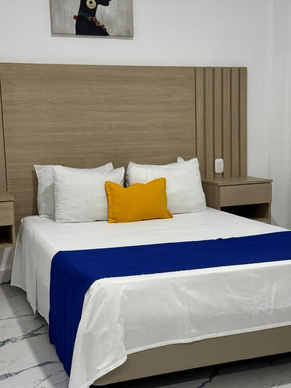 Postel nebo postele na pokoji v ubytování Hotel ITACO