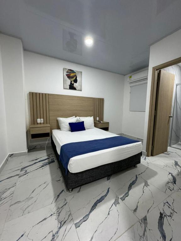 Postel nebo postele na pokoji v ubytování Hotel ITACO
