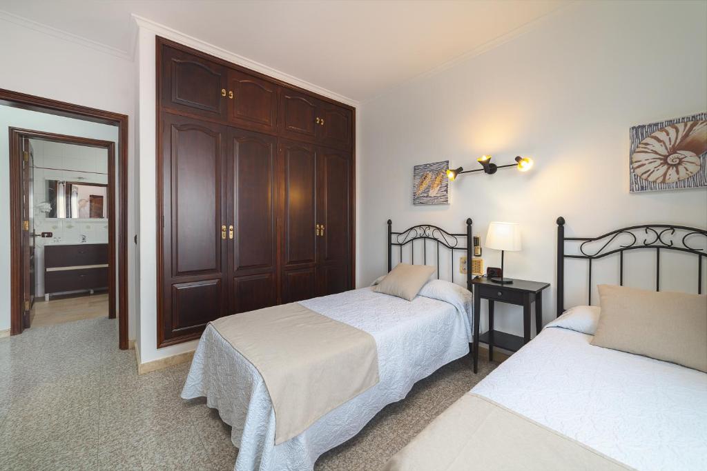 Postel nebo postele na pokoji v ubytování Villa Victoria