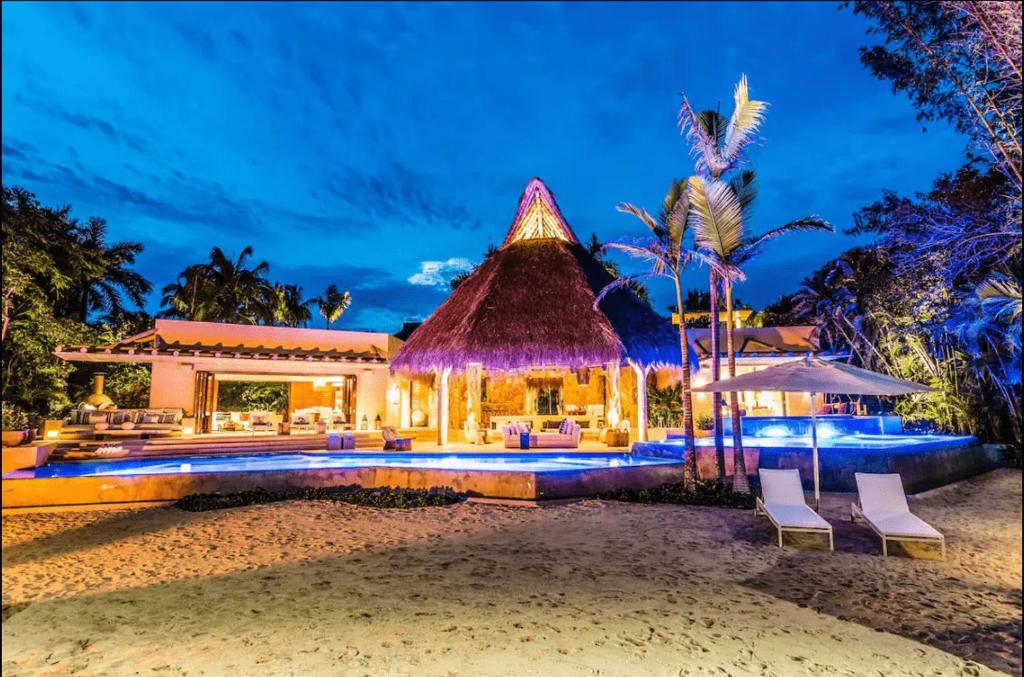 a villa on the beach at night at Hidden All inclusive House in Punta Mita in Punta Mita