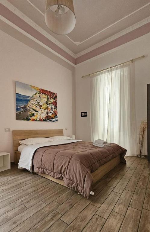 Łóżko lub łóżka w pokoju w obiekcie Home Salvator Rosa 78