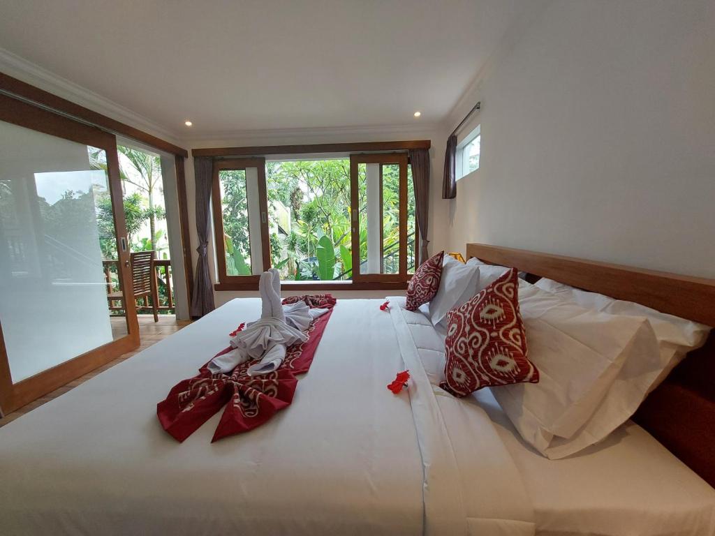 Postel nebo postele na pokoji v ubytování Prema Shiva Suites and Villas by EPS