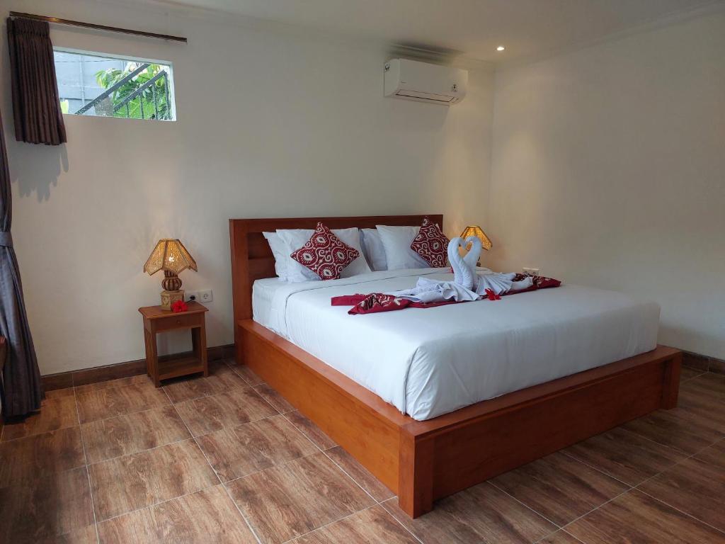 Postel nebo postele na pokoji v ubytování Prema Shiva Suites and Villas by EPS