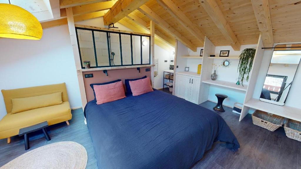 En eller flere senge i et værelse på La Petite Maison