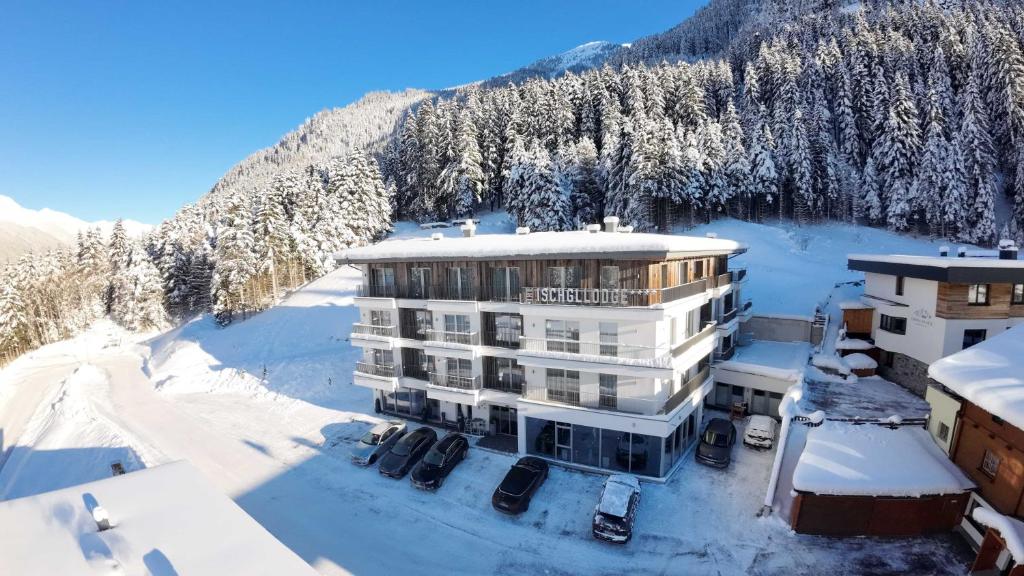 an aerial view of a hotel in the snow at The Ischgl Lodge in Ischgl