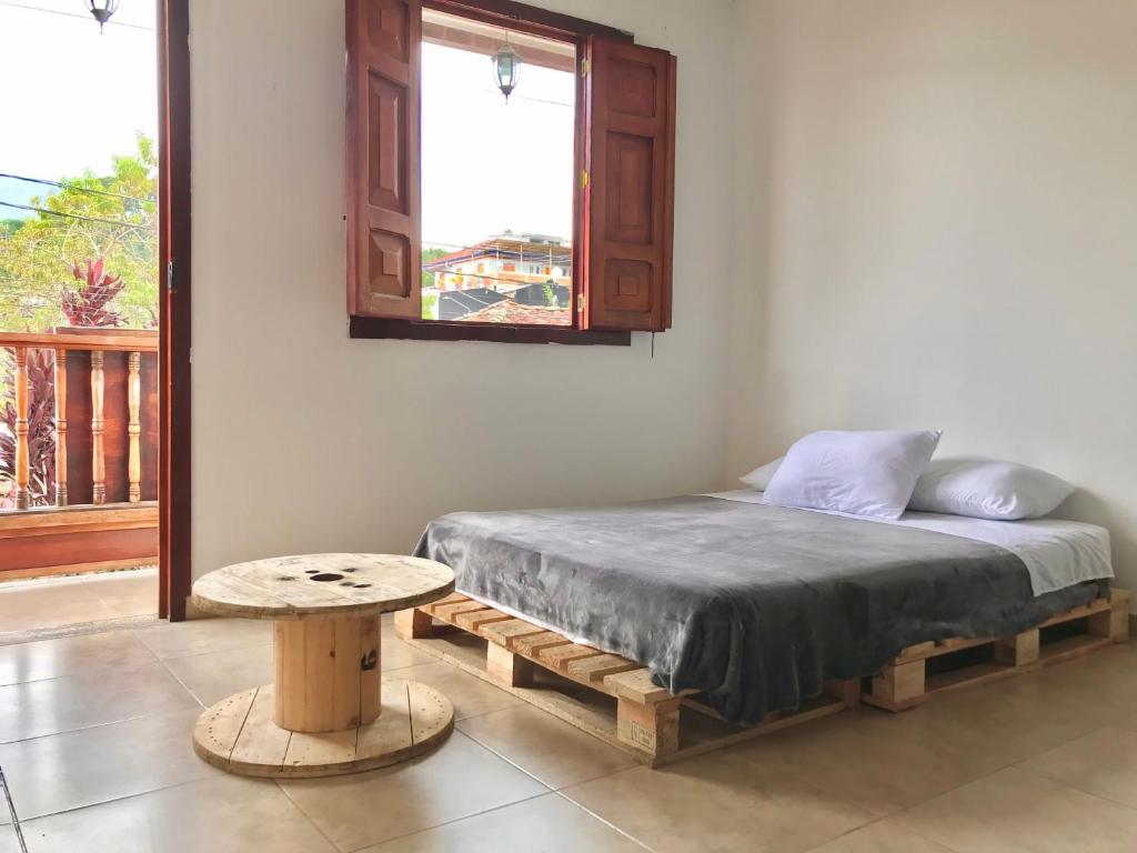 Voodi või voodid majutusasutuse Nature Hostel Salento toas