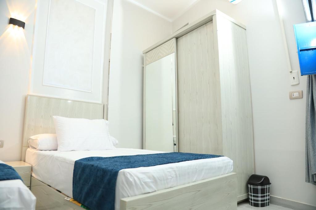 Postel nebo postele na pokoji v ubytování Crystala guest house