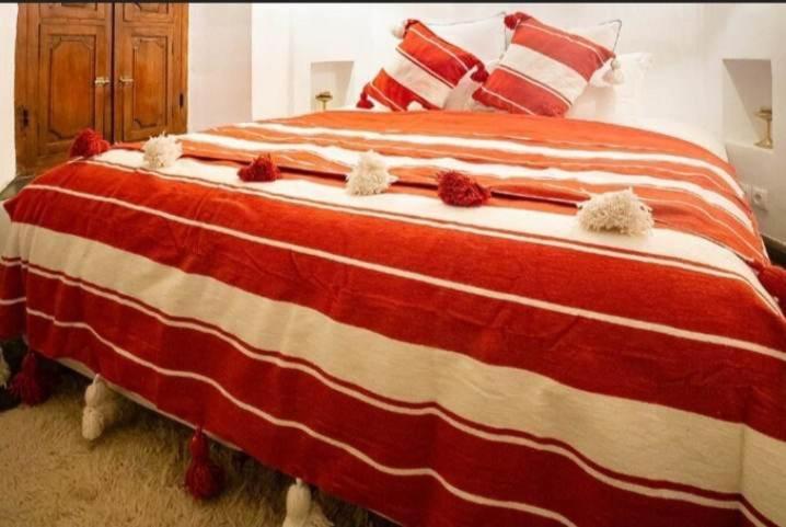 Voodi või voodid majutusasutuse kosasurfmorocco toas
