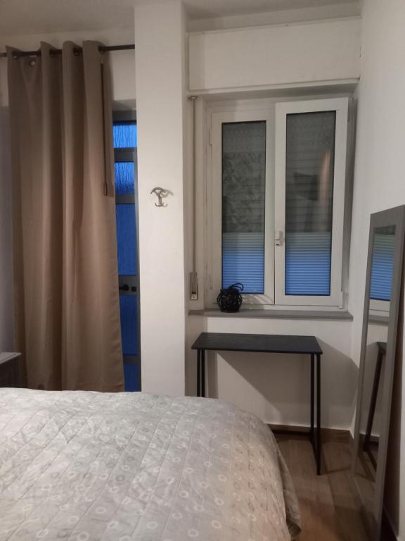 Postel nebo postele na pokoji v ubytování il cortile dei 3 camera matrimoniale