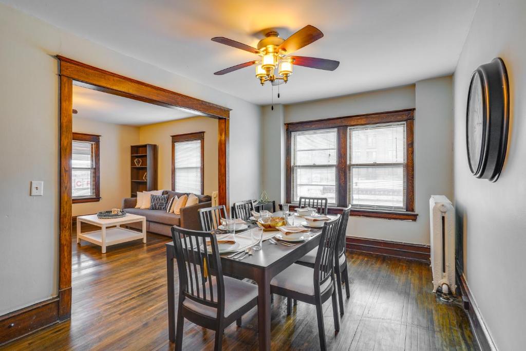 a dining room with a table and chairs at Cozy Minneapolis Apartment, 1 Mi to Downtown! in Minneapolis
