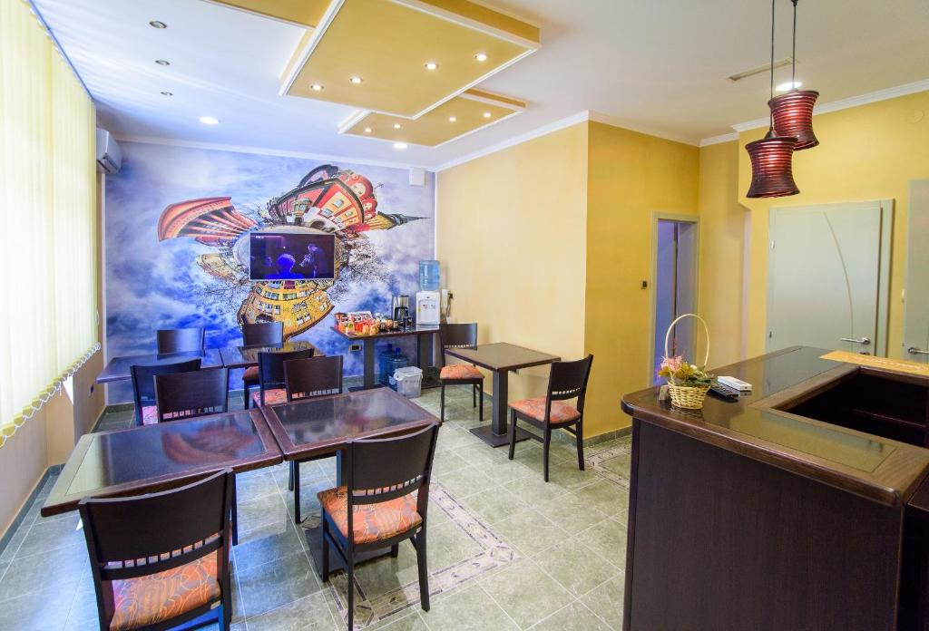 Kuchyň nebo kuchyňský kout v ubytování Guest house Mali hotel