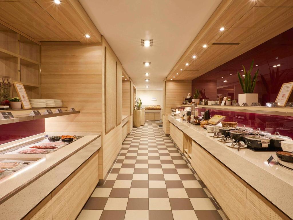 Kuchyň nebo kuchyňský kout v ubytování Pullman Munich