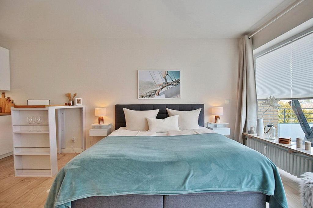 Postel nebo postele na pokoji v ubytování Am Kardohr 3 Am Kardohr 3 Beachway Appartement 12