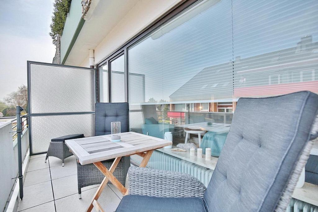 Balkón nebo terasa v ubytování Am Kardohr 3 Am Kardohr 3 Beachway Appartement 12