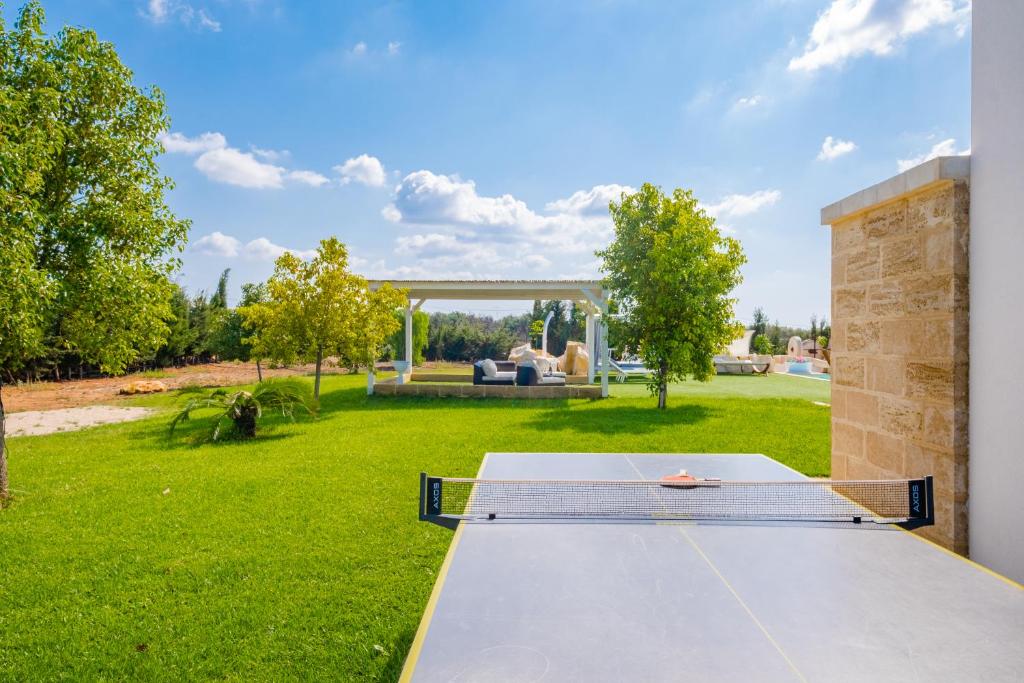 A garden outside Villa Falcone - Luxury Pool Sea View