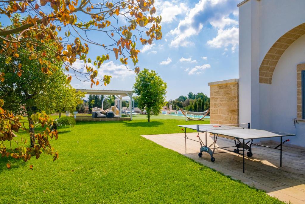 A garden outside Villa Falcone - Luxury Pool Sea View