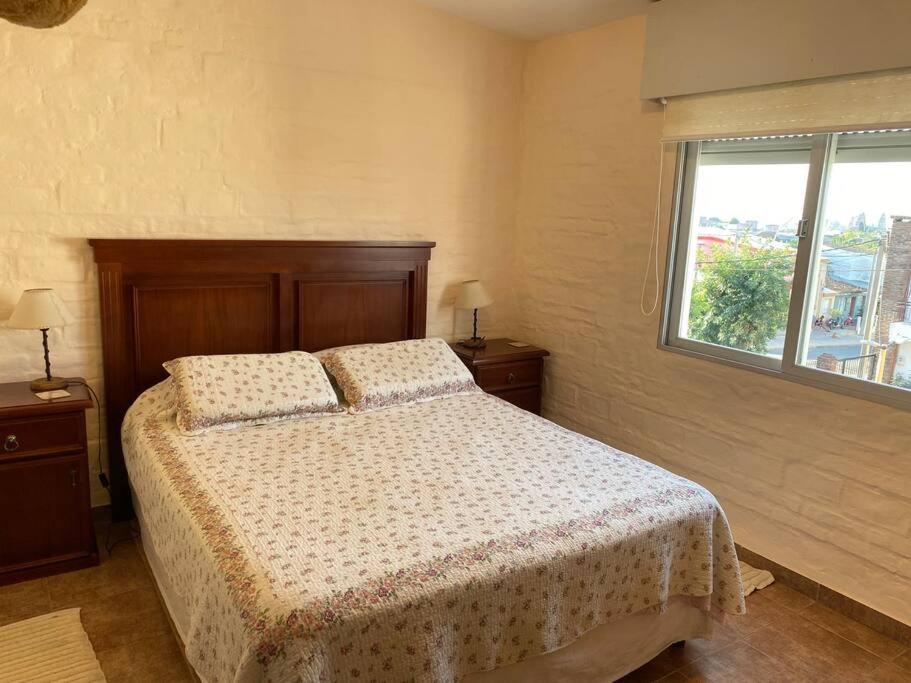 Posteľ alebo postele v izbe v ubytovaní Casa de dos plantas