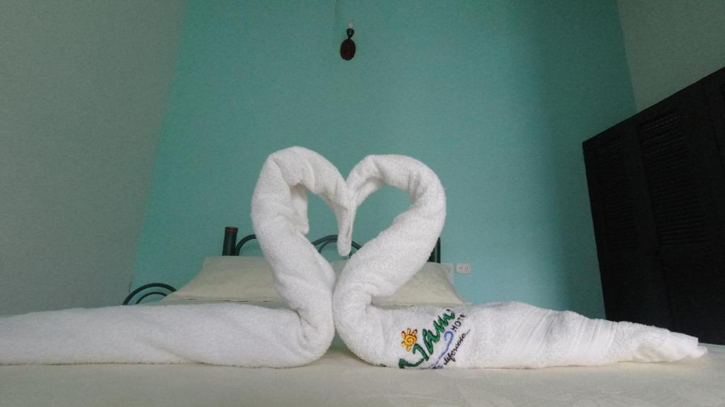 Postel nebo postele na pokoji v ubytování Hotel Miami en Melgar