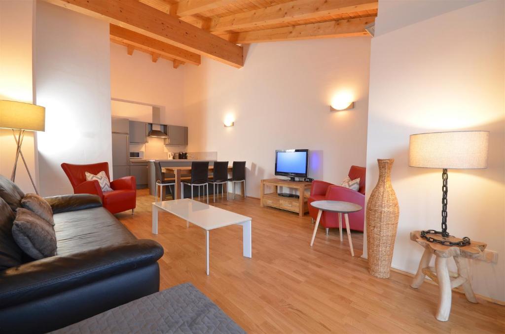 Televízia a/alebo spoločenská miestnosť v ubytovaní APT Mountain View by - Alpen Apartments