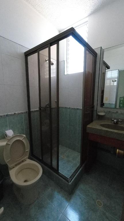 Koupelna v ubytování Hotel Miami en Melgar