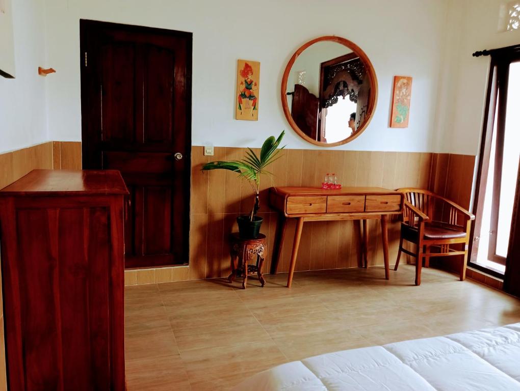 Uma área de estar em Umah Dauh Homestay