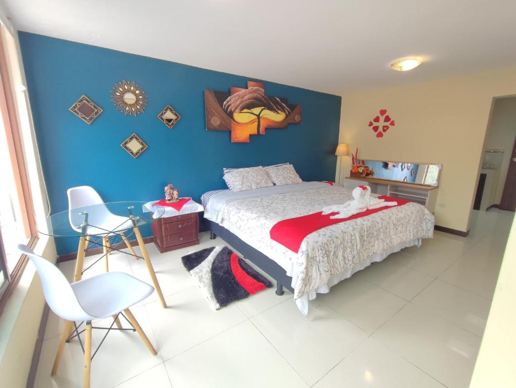 Postel nebo postele na pokoji v ubytování TURI Suite con Jacuzzi, centro de la ciudad