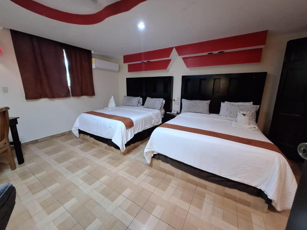 Postel nebo postele na pokoji v ubytování Hotel San Rafael