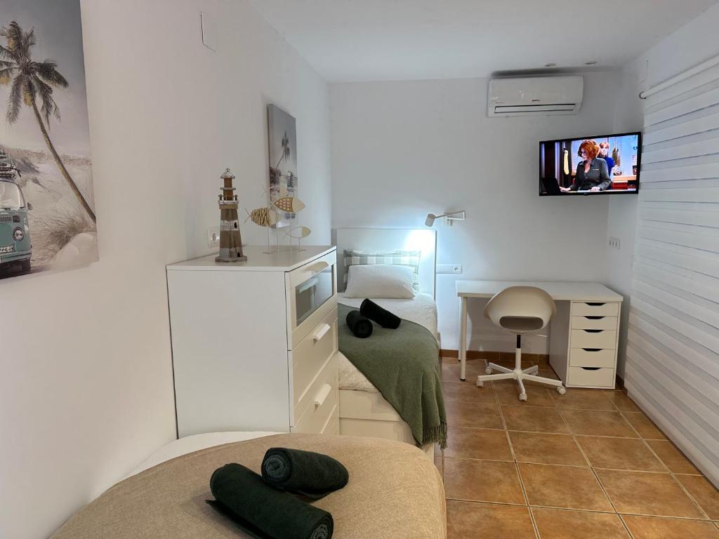 TV a/nebo společenská místnost v ubytování Casa Cullerer