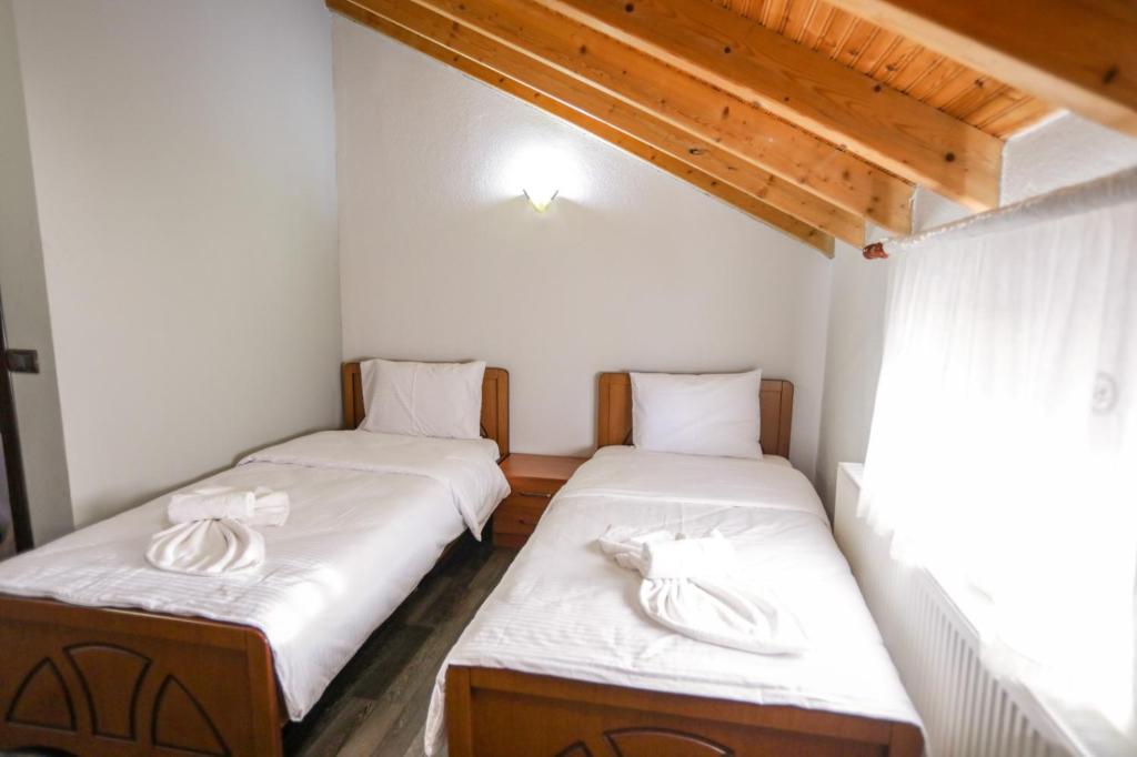 Postel nebo postele na pokoji v ubytování Vila Mata