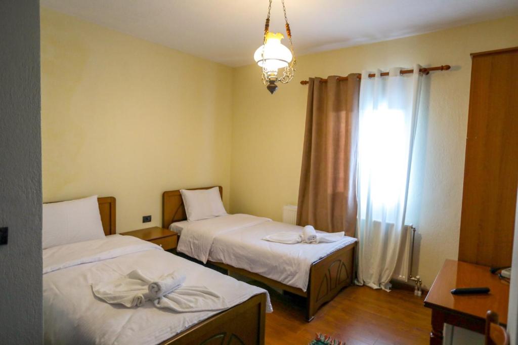 Postel nebo postele na pokoji v ubytování Vila Mata