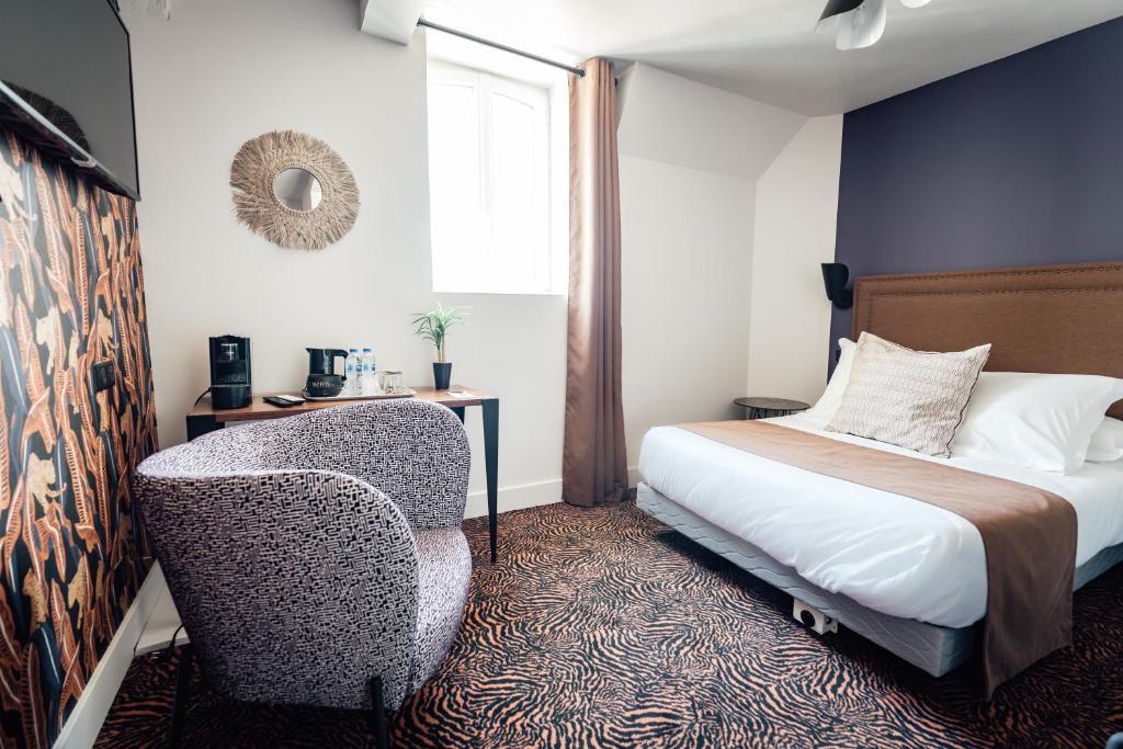 Postel nebo postele na pokoji v ubytování La villa 10 HÔTEL SPA