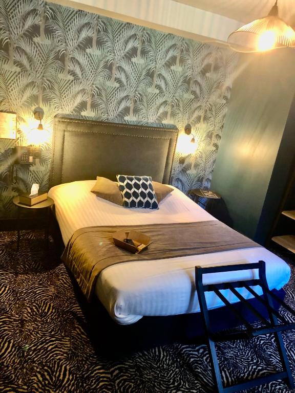 Postel nebo postele na pokoji v ubytování La villa 10 HÔTEL SPA