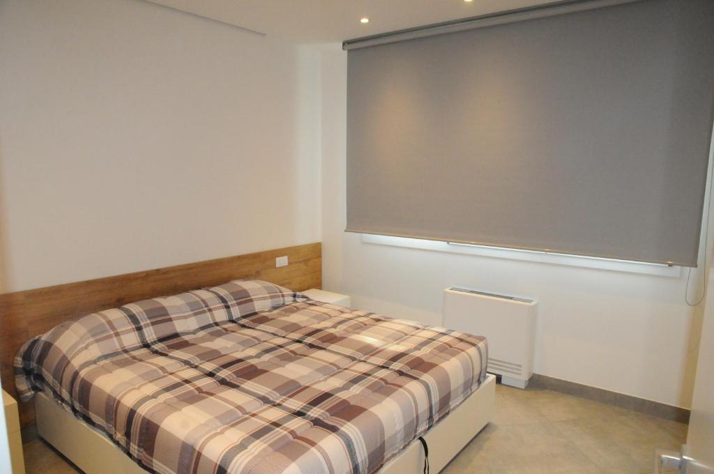 Postel nebo postele na pokoji v ubytování House of Oscar