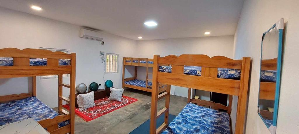 Postel nebo postele na pokoji v ubytování Beach House, San Juan, La Union