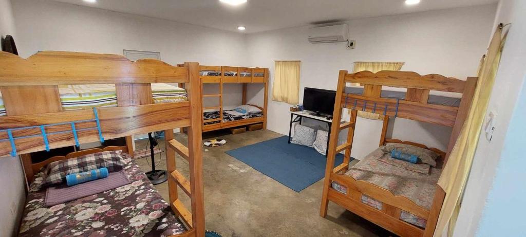 Postel nebo postele na pokoji v ubytování Beach House, San Juan, La Union