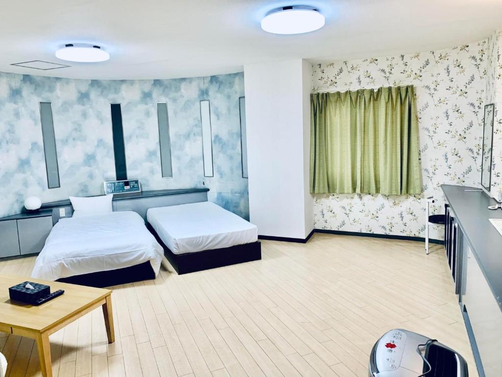 Fotografie z fotogalerie ubytování ビジネスインＮＡＧＡＳＨＩＭＡ v destinaci Hakuro