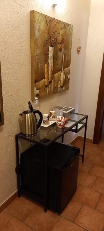 Příslušenství pro přípravu čaje a kávy v ubytování GIRASOLE Wellness e Relax