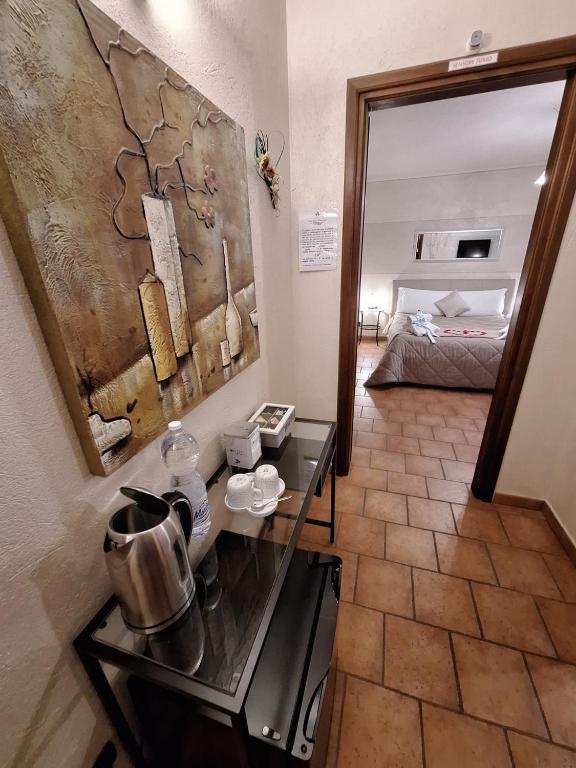 Postel nebo postele na pokoji v ubytování GIRASOLE Wellness e Relax