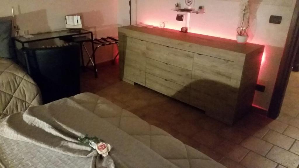 Postel nebo postele na pokoji v ubytování GIRASOLE Wellness e Relax