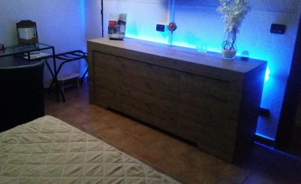 Postel nebo postele na pokoji v ubytování GIRASOLE Wellness e Relax