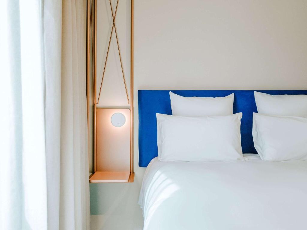 Postel nebo postele na pokoji v ubytování Mercure Brest Centre Port