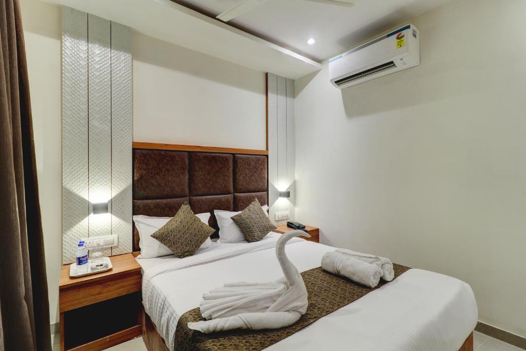 Postel nebo postele na pokoji v ubytování Hotel Sion Fort