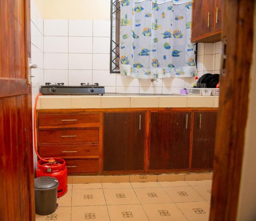 Kuchyň nebo kuchyňský kout v ubytování Clarine Cozy Holiday Home