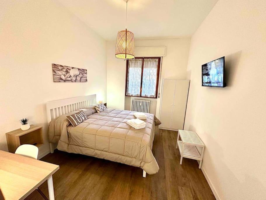 Casa vicino Humanitas & Forum Assago tesisinde bir odada yatak veya yataklar