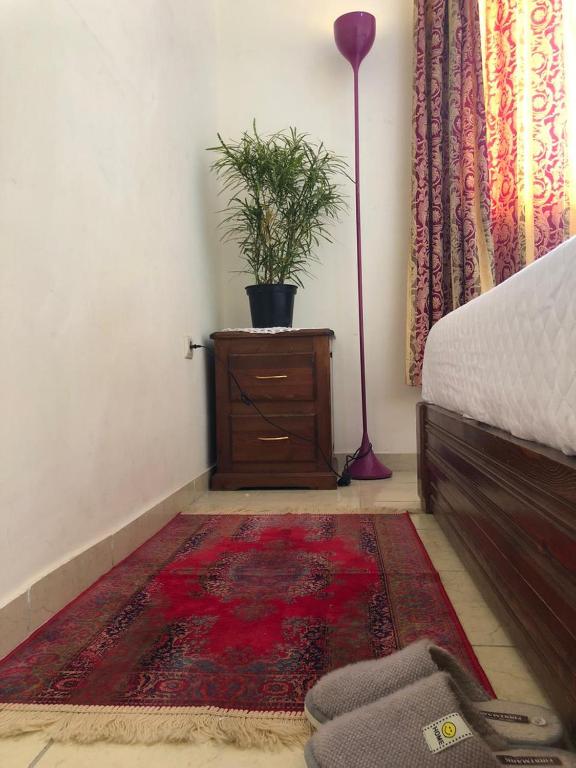 Postel nebo postele na pokoji v ubytování Room in Agadir Morocco