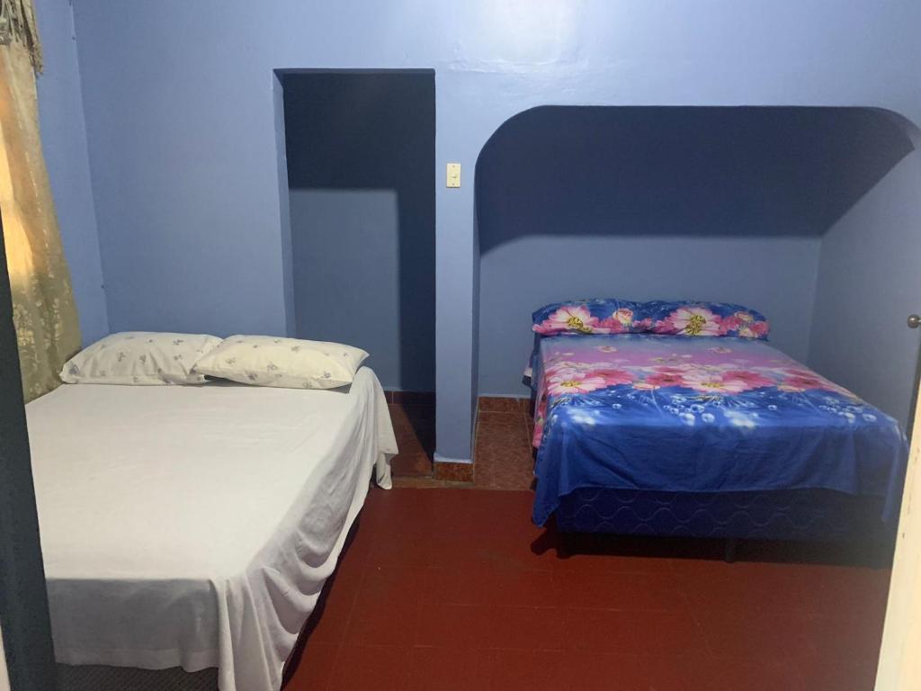 Postel nebo postele na pokoji v ubytování Olvin Javier alvarado aguilar