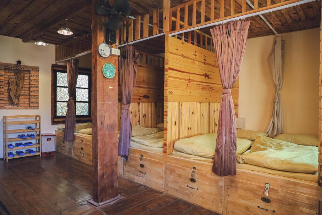 Postel nebo postele na pokoji v ubytování Ziczac Homestay Đà Lạt