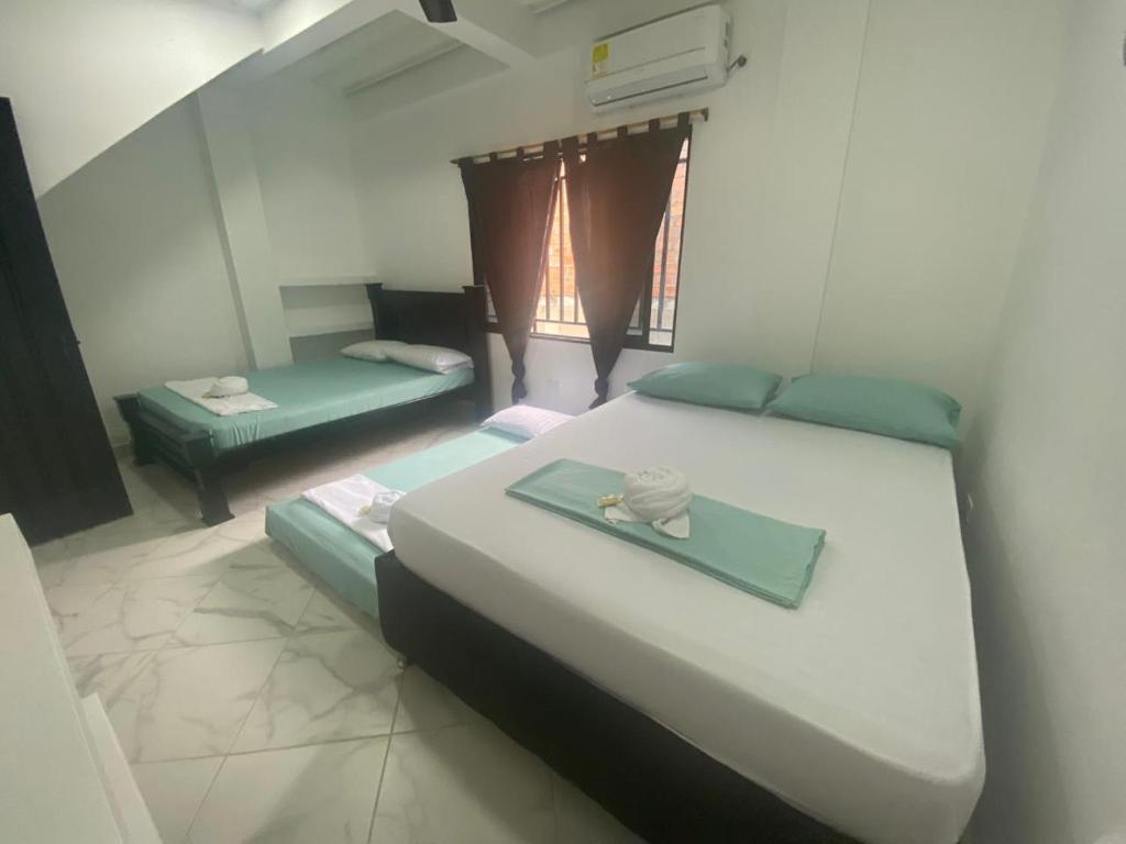 Postel nebo postele na pokoji v ubytování APARTAMENTO vista VERDE DORADAL