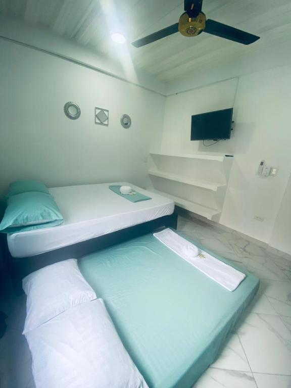 Postel nebo postele na pokoji v ubytování APARTAMENTO vista VERDE DORADAL