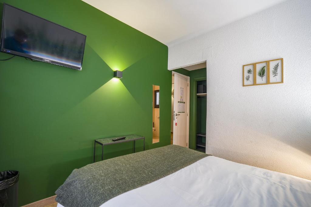 Postel nebo postele na pokoji v ubytování Glaner Hotel Cafe